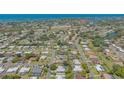 Scenic aerial view of community, highlighting its location near waterways and mature trees at 301 Angelico Dr, Nokomis, FL 34275