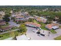 Aerial view of a well-maintained community with mature trees and landscaping surrounding the residences at 5057 Live Oak Cir # 86, Bradenton, FL 34207