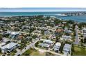 Scenic aerial view showcasing the property's neighborhood and stunning coastal views at 7030 Lois Ave, Longboat Key, FL 34228