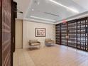 Inviting lobby with seating area and stylish decor, offering a comfortable welcome for residents and guests at 1065 Gulf Of Mexico Dr # 103, Longboat Key, FL 34228