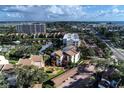 An aerial view of the condos offering beautiful views of the intercoastal waterway and neighborhood at 1200 Cove Ii Pl # 832, Sarasota, FL 34242