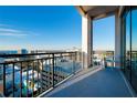 Spacious condo balcony with seating and city views at 33 S Palm Ave # 1602, Sarasota, FL 34236