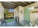 Inviting entryway with screened porch, offering a relaxing outdoor space at 672 White Pine Tree Rd # 57, Venice, FL 34285