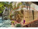 A view of the wooden fence providing privacy and security around the property at 672 White Pine Tree Rd # 57, Venice, FL 34285