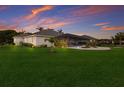 Expansive backyard featuring lush green lawn and private fencing at 14210 9Th Ne Ter, Bradenton, FL 34212