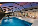 Inviting screened-in pool area with an outdoor lounge area and dining, perfect for relaxation at 14210 9Th Ne Ter, Bradenton, FL 34212