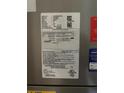 Close-up of the HVAC Unit displaying the unit's specifications and certifications at 1723 Fred Ives St, Ruskin, FL 33570