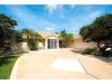 Charming home featuring a spacious driveway, a two car garage, and a screen door entrance at 3201 Wilderness W Blvd, Parrish, FL 34219