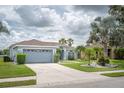 Lovely single-Gathering home with a two-car garage and beautiful landscaping at 12026 Warwick Cir, Parrish, FL 34219