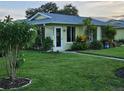 Well maintained single story home with beautiful landscaping and lawn at 6902 11Th W Ave, Bradenton, FL 34209