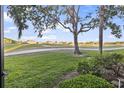 Back yard view of golf course at 803 Fairwaycove Ln # 102, Bradenton, FL 34212