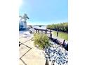 Exterior shot of private dock with bench along a waterfront property at 36 N Starboard Dr, Venice, FL 34285