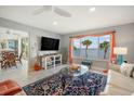 Comfortable living room with a large window providing scenic ocean views and bright light at 6470 Mourning Dove Dr # 201, Bradenton, FL 34210