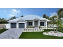Stunning home with a metal roof, lush lawn, and two car garage at 8001 20Th W Pl, Bradenton, FL 34209