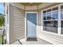 Inviting condo front door, number 624, with welcome mat and a storm door at 850 S Tamiami Trl # 624, Sarasota, FL 34236