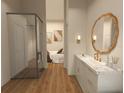 Elegant bathroom featuring marble countertops, double sinks, a shower with glass, and access to the main bedroom at 12541 Estrella Blvd, Punta Gorda, FL 33955