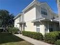 Charming exterior with a well-manicured lawn, sidewalk, and light-colored siding at 3405 54Th W Dr # 104, Bradenton, FL 34210