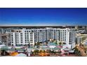 Luxury condominium building featuring a community pool, outdoor space, and prime location at 111 S Pineapple Ave # 1210, Sarasota, FL 34236