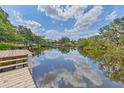 Enjoy relaxing water views from this property with private dock access for boating and recreation at 1130 Mill Creek Rd, Bradenton, FL 34212