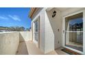 Inviting condo entrance featuring a charming welcome mat and a secure front door at 5269 Wedgewood Ln # 36, Sarasota, FL 34235