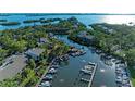 Beautiful aerial view showcases the marina and surrounding lush community at 1617 Bayhouse Ct # 121, Sarasota, FL 34231