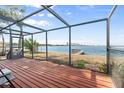 Relaxing screened patio overlooking tranquil water views with a private dock and city skyline at 377 22Nd Se Ave, St Petersburg, FL 33705