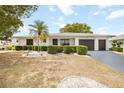Inviting single-story home with a two car garage, nice landscaping, and modern updates at 624 Fort Duquesna Dr, Sun City Center, FL 33573