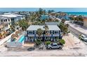 Charming beachfront home featuring a pool and tiki hut, perfect for relaxation and entertaining guests at 101 25Th N St # 1, Bradenton Beach, FL 34217