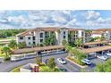 Beautiful condo building, landscaped parking, and golf course view at 17118 Vardon Ter # 304, Bradenton, FL 34211