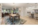 Open floorplan view of the dining room, living room, and kitchen at 4548 Chinkapin Dr, Sarasota, FL 34232