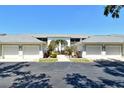 Charming condo with an attached garage and a beautifully landscaped courtyard at 9470 High Gate Dr # 2213, Sarasota, FL 34238