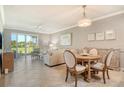 Inviting living room and dining area with lots of natural light and neutral tones at 9470 High Gate Dr # 2213, Sarasota, FL 34238
