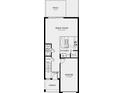 First floor floorplan featuring an open-concept design with kitchen, great room, and half bath at 15173 Cuzcorro Ct, Nokomis, FL 34275