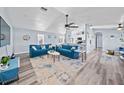 Inviting living room with hardwood floors, recessed lighting, and plenty of natural light at 3416 Crape Myrtle Dr, Hernando Beach, FL 34607