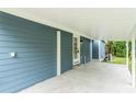 Covered carport with access to the house at 3608 Water St, Ellenton, FL 34222