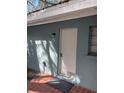 Close-up view of the entrance door with the number five at 170 Roosevelt Dr # 5, Sarasota, FL 34236