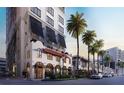 Luxury building exterior showcasing architectural details, palm trees, and street view at 33 S Palm Ave # 1501, Sarasota, FL 34236
