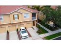 Beautiful townhome with private garage, screened in porch, and well manicured landscaping and long driveway at 3784 Parkridge Cir # 22-203, Sarasota, FL 34243