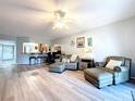 Well-lit living area featuring contemporary flooring and stylish furniture with ample space for relaxing at 5234 Lake Arrowhead Trl # 30, Sarasota, FL 34231