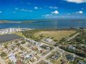 Gorgeous aerial view of a waterfront community with stunning views of the water and islands at 2402 16Th W St, Palmetto, FL 34221
