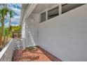 Charming tiled entryway and patterned front door at 3599 Bali Dr, Sarasota, FL 34232