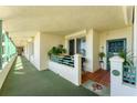 Private balcony with outdoor seating, offering a cozy and inviting space to relax at 4801 Osprey S Dr # 405, St Petersburg, FL 33711