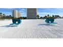Relax on the beach with provided lounge chairs and enjoy the proximity to the luxury condos at 5966 Midnight Pass Rd # G-51 & G-58, Sarasota, FL 34242