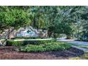 Community entrance sign with lush landscaping and a well-maintained entrance at 11924 Persian Ter, Bradenton, FL 34212