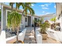 Inviting front entrance featuring tiled steps and mature landscaping at 1211 Spoonbill Landings Cir, Bradenton, FL 34209