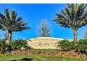 Welcome to The Isles on Palmer Ranch, a beautiful community showcased by palm trees at 1831 Burgos Dr, Sarasota, FL 34238