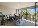 Screened patio with stylish furniture, perfect for outdoor dining and relaxation at 5685 Palmer Cir # 204, Lakewood Ranch, FL 34211