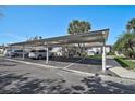 Spacious carport area, perfect for parking multiple vehicles with ample space for residents and guests at 151 Vista Hermosa Cir # 31C, Sarasota, FL 34242