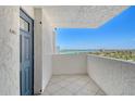 Relaxing balcony featuring tile floors, offering stunning water views, perfect for enjoying the coastal breeze and scenery at 20 Whispering Sands Dr # 1201, Sarasota, FL 34242