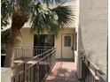 Welcoming entrance with a decorated front door and a well-maintained walkway at 6430 Sun Eagle Ln # 203, Bradenton, FL 34210